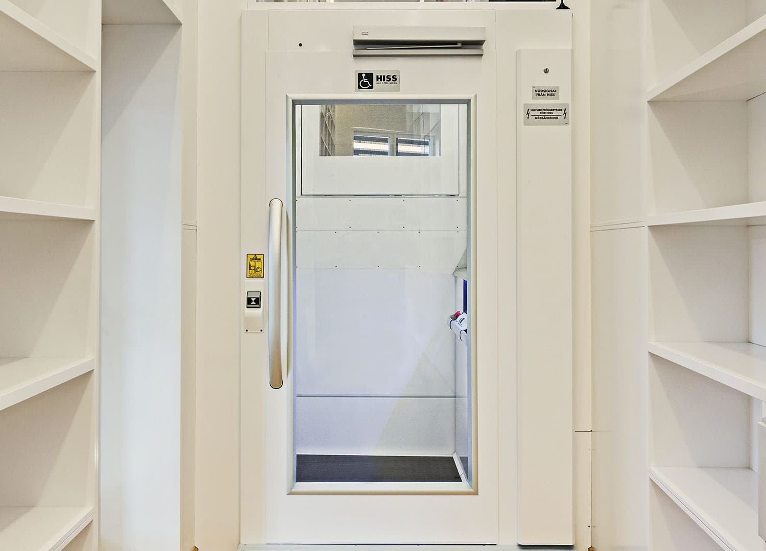 Professional platform lift removal service showing a modern platform lift being carefully dismantled