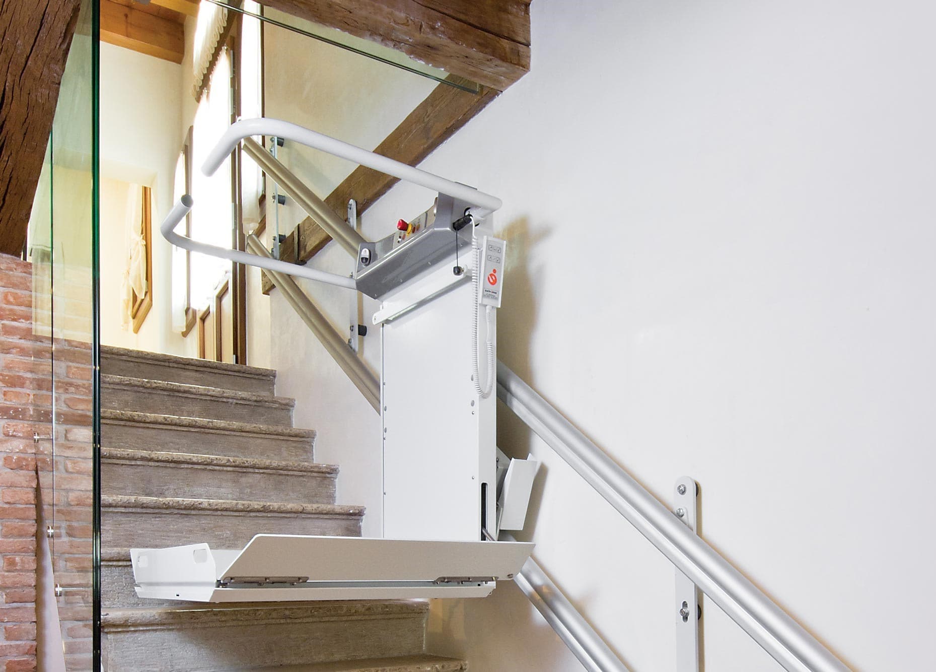 Wheelchair stairlift removal service showing careful dismantling of accessibility equipment