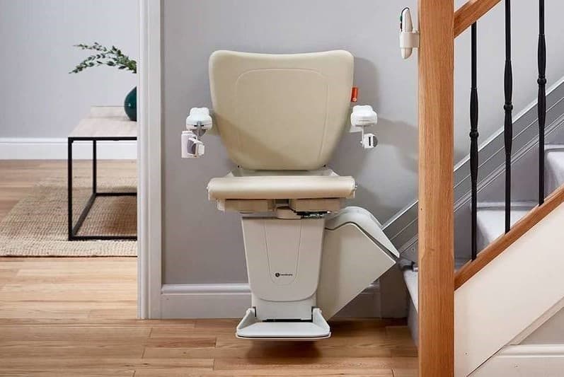 Stairlift removal service demonstrating professional dismantling of residential stairlift
